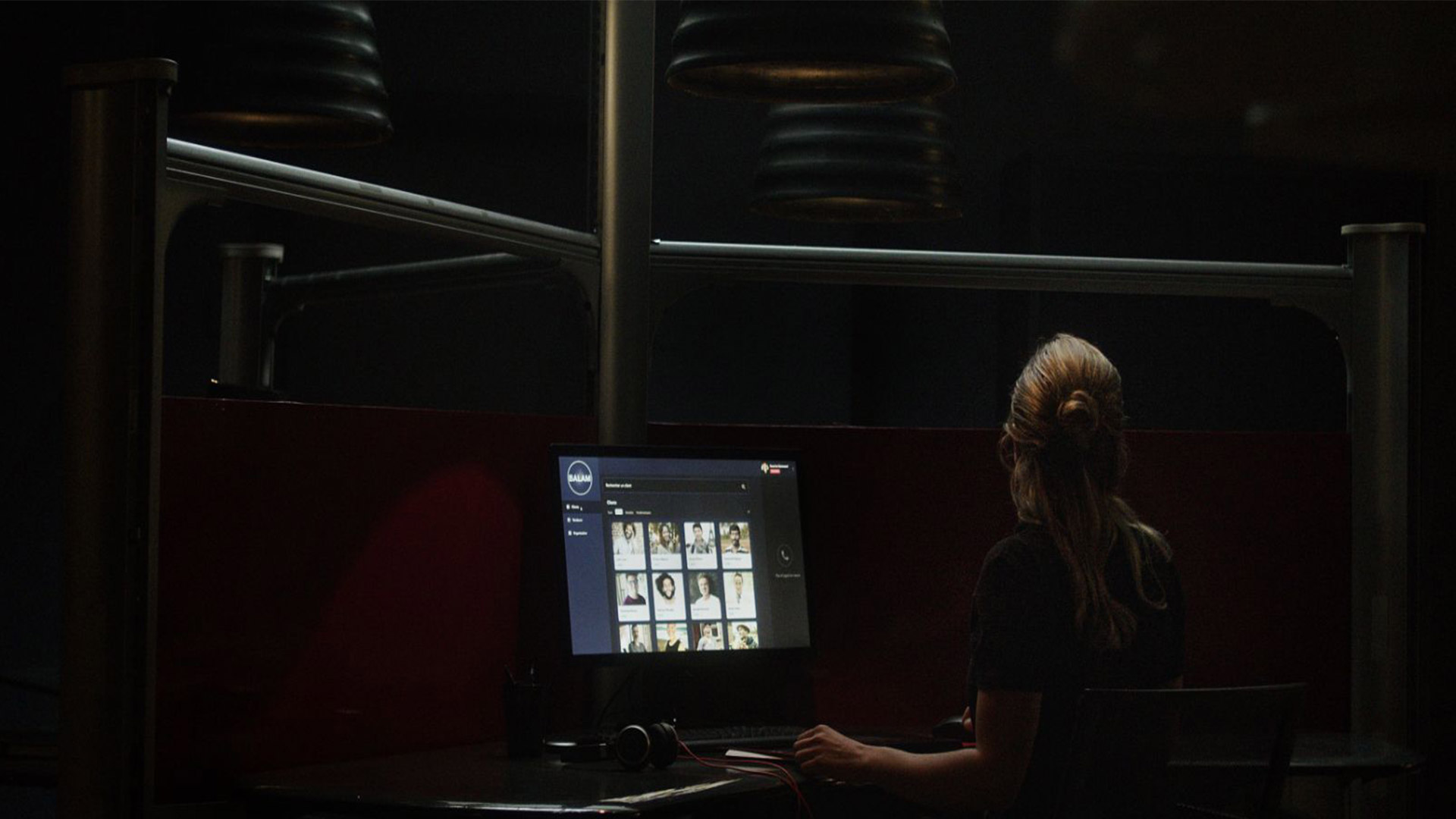 A woman works on her computer