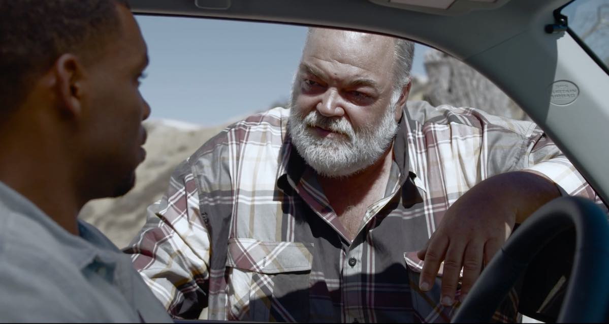 The Listening film still young man stops to ask for directions.