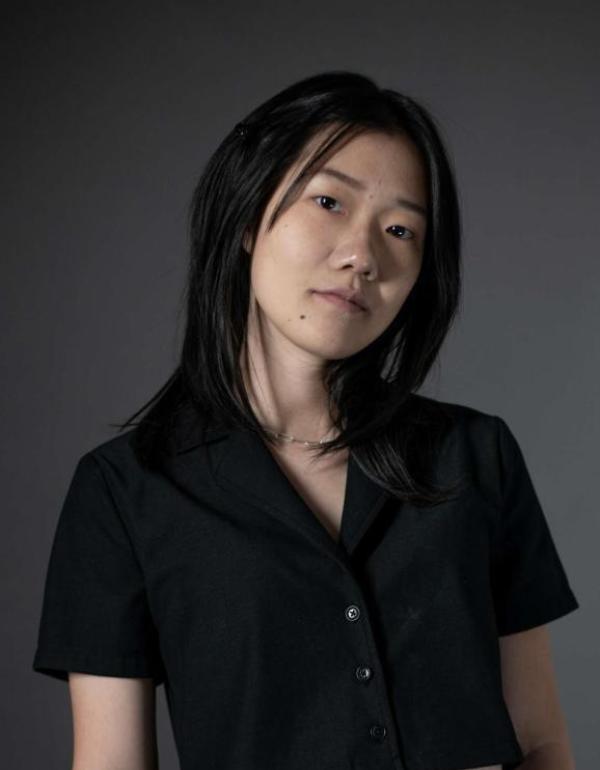 A girl wearing a black shirt