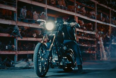 Headless biker riding on chopper motorcycle