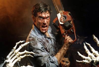 Ash takes on the demons with his chainsaw