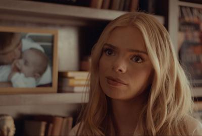 Young woman looks on