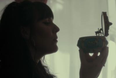 Hannah stares at a music box