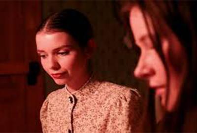 Two women sitting together