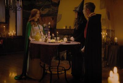 Father and daughter speak with homeowner on Halloween