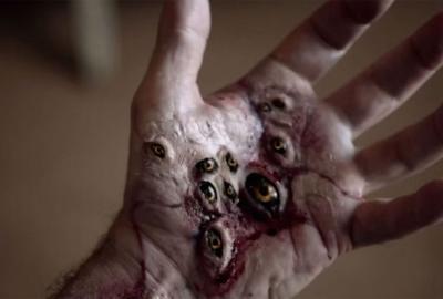 I Am the Doorway film still pencil in a scab exposes an eye