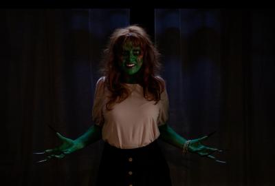 Welcome to Our Home film still of a green skinned woman