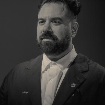 Black and white portrait of Michael Zumaya
